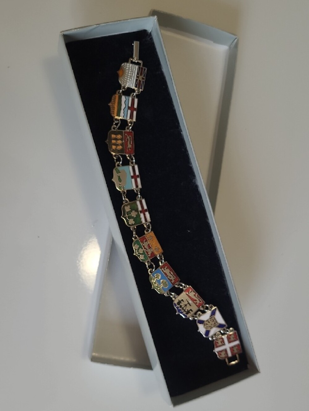 Vintage bracelet featuring the coat of arms shields of Canada's 10 provinces
